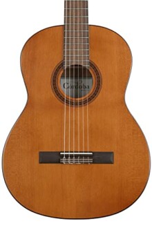 Front view of a classical guitar with wooden finish.